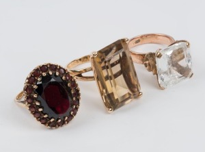 Three assorted gold rings set with stones, two 14ct and one 9ct gold, ​​​​​​​29.8 grams total