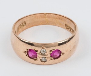 An antique 15ct yellow gold ring, set with two diamonds flanked by rubies, 19th century, ​​​​​​​3.8 grams