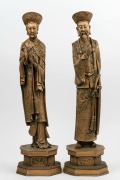 A pair of Chinese figural statues, cast resin and gold painted finish, 20th century, 52cm high