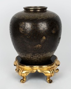 A Japanese bronze vase with wave and fish decoration with gilded highlights and stand, Meiji period, seal mark to base, 38cm high overall