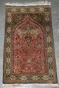 A Persian fine silk hand-knotted prayer rug with olive green and burnt sienna ground,  ​​​​​​​136 x 78cm