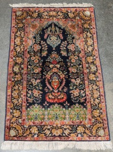 A Persian silk and fine cotton prayer rug on dark blue and lime green ground,  ​​​​​​​155 x 94cm