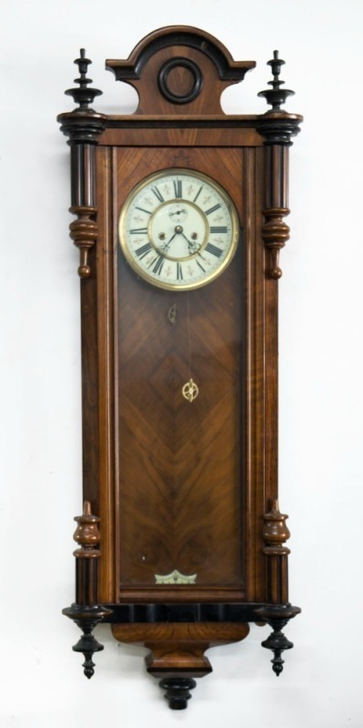 Vienna regulator twin weight wall clock in walnut case with roman numerals and subsidiary dial, 19th century, 115cm high 