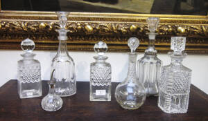 ANTIQUE DECANTERS: group of six 19th century crystal decanters and a bitters bottle with sterling silver top. 