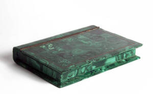 A malachite cased mineral specimen collection in the form of a book, 4cm high, 27cm long, 20cm wide