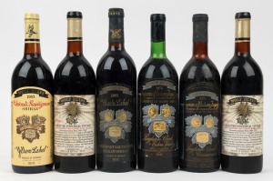 A WOLF BLASS HALF DOZEN: 1971 Bilyara Selected Individual Vintage Cabernet Sauvignon - Eden Valley (2 bottles), 1973 Black Label Jimmy Watson Trophy (1 bottle), 1974 Black Label Jimmy Watson Trophy (1 bottle), 1983 Cabernet-Sauvignon Shiraz Yellow Label (1 bottle) and 1985 Black Label Cabernet Sauvignon Merlot Shiraz (1 bottle). Total: 6 bottles.
