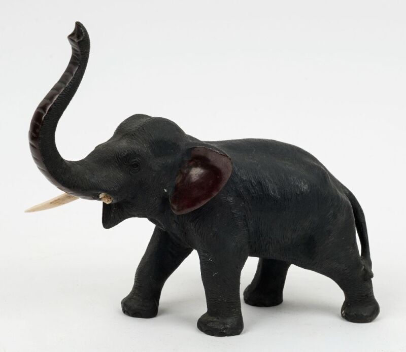 A Japanese bronze elephant statue, Meiji period, early 20th century, seal mark to base, ​​​​​​​19cm high, 22cm long