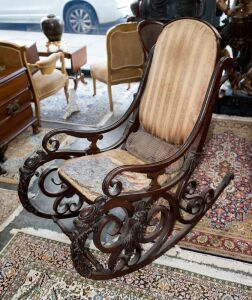 An antique English rocking chair, superbly crafted in stained beech with ornate acanthus carved decoration, 19th century. Relic barn find condition. 114cm high, 60cm across the arms