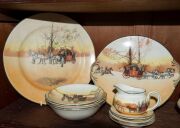 ROYAL DOULTON&nbsp;"Coaching Days" porcelain bowls, dishes, trivet, and plate; together with a series ware dish, 20th century, (33 items), ​​​​​​​the largest 28cm wide - 3