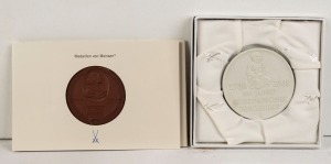 Two MEISSEN German porcelain commemorative plaques, 21st century, the larger 6.5cm diameter