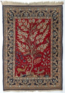 A Persian blue and red hand-woven rug decorated with animals and tree,  ​​​​​​​154 x 105cm