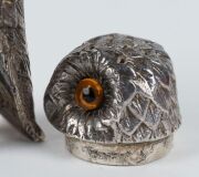 A pair of English sterling silver owl condiments adorned with glass eyes, London, circa 1901, 6cm high, 142 grams total - 6