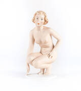 German porcelain female nude statue in the art deco style. Height 19.5cm.