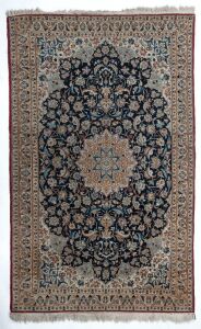 A Persian hand-woven fine cotton and wool rug with navy blue and beige ground,  ​​​​​​​210 x 115cm