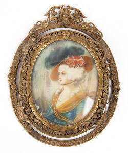 MINIATURE PORTRAIT: Painted on ivory of Marie Antoinette housed in ornate brass oval frame. 14cm x 11cm overall