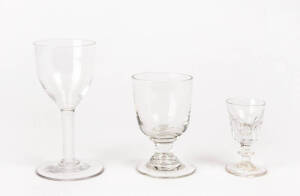 GEORGIAN WINE GLASSES: Group of 3 including a fine air twist stem wine glass with bell shaped bowl; faceted sherry glass c1830s & an early 19th century soda glass rummer.