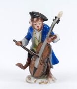 VOLKSTEDT "MONKEY BAND" 11 piece German porcelain ensemble, 20th century, blue factory mark to bases, the largest 16cm high - 12