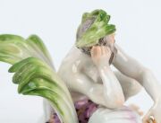 MEISSEN antique German porcelain statue of a seated man with water pot and laurel wreath, 18th/19th century, crossed swords mark to base, ​​​​​​​7.5cm high, 8cm wide - 9