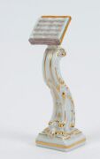 "MONKEY BAND" group of ten assorted German porcelain statues plus a music stand, various factories, predominantly MEISSEN, 19th/20th century, (11 items), ​​​​​​​the largest 15.5cm high - 7