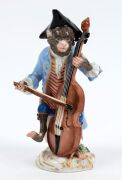 "MONKEY BAND" group of ten assorted German porcelain statues plus a music stand, various factories, predominantly MEISSEN, 19th/20th century, (11 items), ​​​​​​​the largest 15.5cm high - 10