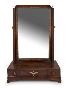 A Georgian mahogany toilet mirror with cross grain and parcel gilt mirror frame edge above three inverted cavetto fronted drawers and ogee bracket feet, original brass hardware, circa 1760 59cm high, 42cm wide, 20cm deep