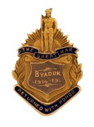 "THE GREAT WAR, RETURNED WITH HONOUR" 15CT GOLD AND ENAMEL FOB, ENGRAVED "Byaduk 1914-19, Presented to Dr. C. WAKLEY by the Residents of Byaduk", 3.6cm high, 7.7 grams