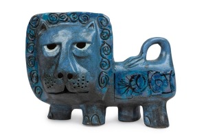 McLAREN pottery lion statue with blue glaze, incised "McLaren", 19cm high, 24cm long
