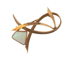 A vintage 9ct gold and solid milk opal brooch, circa 1970, stamped "9ct", 4.5cm wide, 5.6 grams total