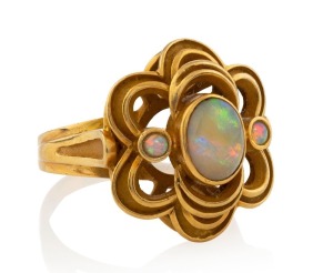 A vintage 14ct yellow gold ring, set with three opals, stamped "585", 11 grams total