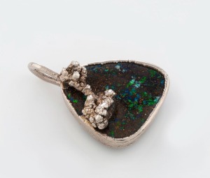 An Australian silver and Queensland boulder opal pendant, ​​​​​​​2.8 cm high