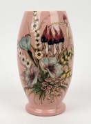 GUY BOYD pink glazed pottery vase decorated with Australian wildflowers incised "Guy Boyd", 21.5cm high