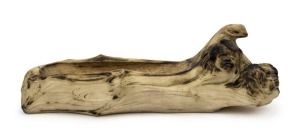 WILLIAM RICKETTS pottery coolamon with snake's head and four aboriginal faces, incised "Wm. Ricketts", 34cm long