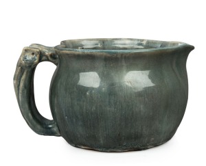 MERRIC BOYD early pottery vase glazed in grey with applied gumnut and leaf to the handle, incised "Hand Craft, Boyd, 1921", 11cm high, 19cm wide