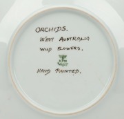 FLORA LANDELLS (1888-1981), hand-painted porcelain plate, titled verso "ORCHIDS, WEST AUSTRALIA WILD FLOWERS, Hand Painted", signed "F. Landells", ​​​​​​​23cm diameter - 2