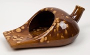 An Australian colonial pottery slipper pan with Rockingham glaze, 19th century, ​​​​​​​38cm long - 2