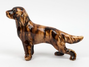 ALBA WARE (Sydney) brown glazed pottery dog statue, 13cm high x 19cm long