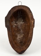 MAORI face plaque, hand-finished moulded composite, stamped "AUCKLAND MUSEUM", early to mid 20th century, 15.5cm high - 2