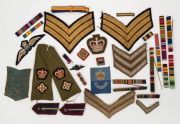 Various military ribbon bars, shoulder patches and epaulettes, sergeants stripes, etc. (32 items).