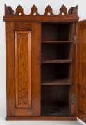 An antique Australian apprentice miniature linen press in the Gothic style, red pine and cedar with a crenelated cornice, South Australian origin, 19th century, 69cm high, 44cm wide, 25cm deep - 2