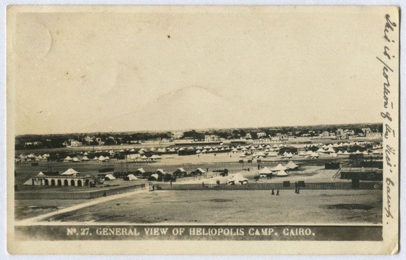 AN AUSTRALIAN NURSE AT HELIOPOLIS: 14 Feb.1916 real photo postcard ("No.27, GENERAL VIEW OF HELIOPOLIS CAMP. CAIRO") with hand-written message (posted under cover) to her sister, Flo. "We are told that our unit may move off anytime now to France...". Unce