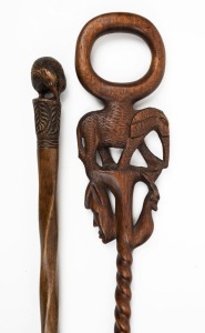 Two walking sticks, one New Zealand with kiwi handle, the other African with elephant handle, 20th century, ​​​​​​​89cm and 91cm high