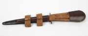 Fairbairn–Sykes Commando knife, stamped "15 DET, No,1 SPECIAL FORCES" with broad arrow stamp, in original period leather scabbard, 29cm long - 2