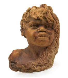 WILLIAM RICKETTS pottery wall plaque of a boy, "Wm. Ricketts", ​​​​​​​27cm high