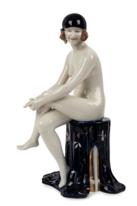 ROYAL DUX Austrian porcelain statue of a seated female nude, pink triangle mark to base, 37cm high