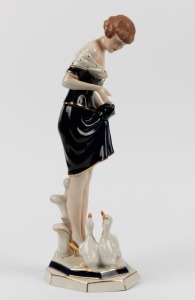 ROYAL DUX Czechoslovakian porcelain statue of a woman feeding ducks, pink triangle mark to base, 35cm high