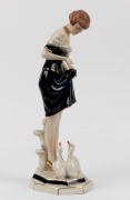 ROYAL DUX Czechoslovakian porcelain statue of a woman feeding ducks, pink triangle mark to base, 35cm high