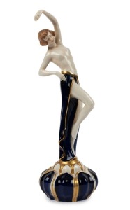 ROYAL DUX Czechoslovakian Art Deco porcelain statue of a dancing lady on lotus base, pink triangle mark to base, 34cm high