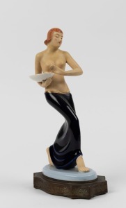 ROYAL DUX Czechoslovakian Art Deco porcelain statue mounted on embossed metal base, marks obscured, 28.5cm high