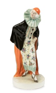 GOLDSCHEIDER Austrian Art Deco porcelain statue of a lady in a black cape with orange cap, black factory mark "Goldscheider", 45cm high