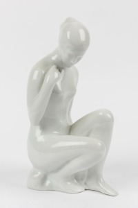 ROYAL DUX Czechoslovakian white porcelain statue of a female nude, blue factory mark to base "Royal Dux, Made in Czechoslovakia", 26cm high